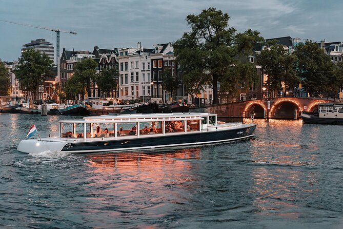 Amsterdam Small-Group Evening Canal Cruise Including Wine, Craft Beer, Cheese - Why Amsterdam looks better from the canals at night