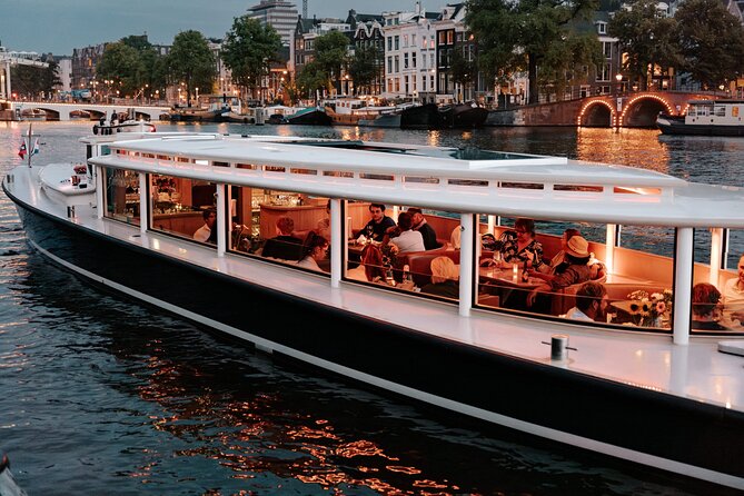 Amsterdam Small-Group Evening Canal Cruise Including Wine, Craft Beer, Cheese - Anne Frank House, Skinny Bridge, and the Amstel