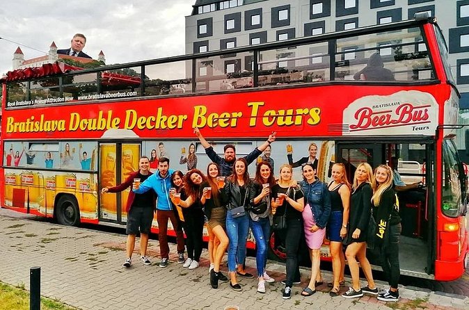 Bratislava Double Decker Beer Tour - Pouring beer while the city rolls past