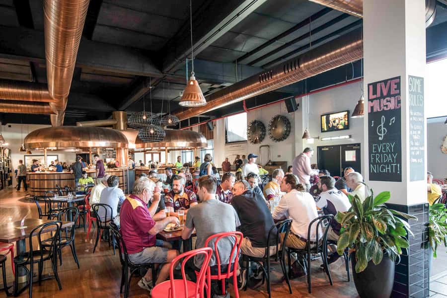 Brisbane: XXXX Beer Brewery Tour and Beer Tasting - Walking through a heritage-listed working brewery