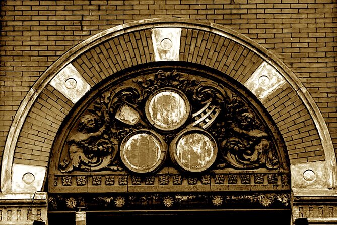 Darkside of Brewing Tour: Tales of Cincinnati's Haunted and Gruesome Past - Inside the Imperial Theater with a flashlight