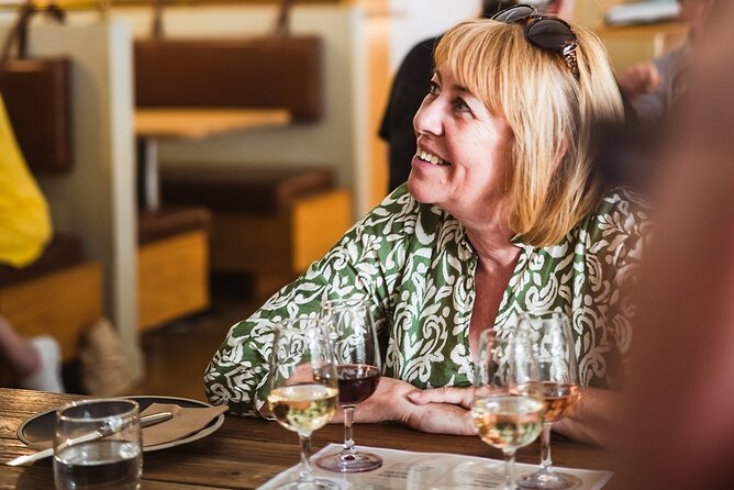 Queenstown: Afternoon Wine & Beer Tour with Platters - The guides can make or break the mood