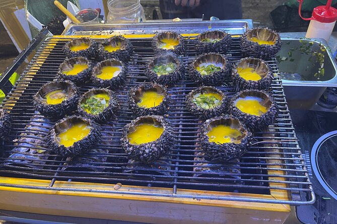 Saigon Night Craft Beer and Street Food By Scooter and motorbike - Frozen Beer, sprouting egg, and fried beef tendon