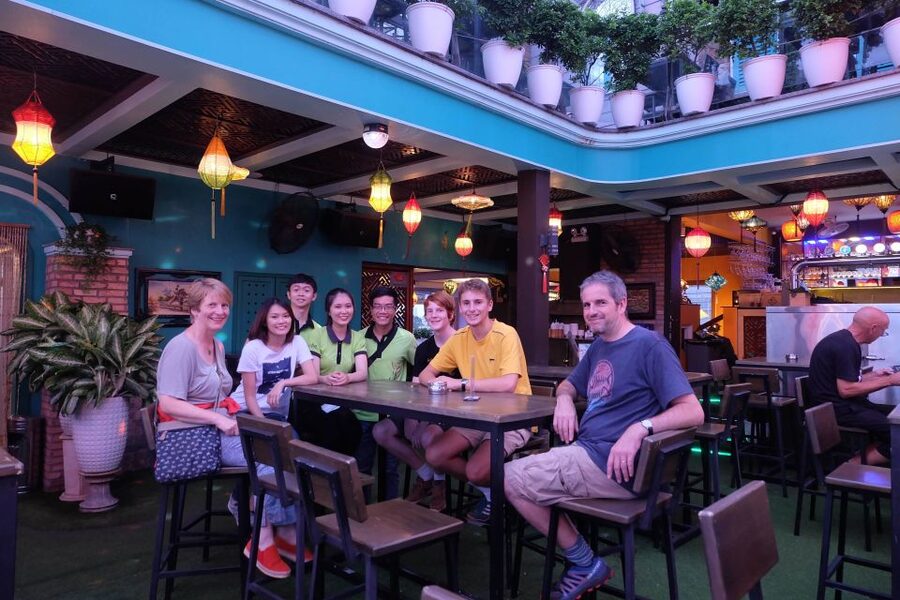 Saigon: Night Craft Beer And Street Food Tour By Vespa - A rooftop beer with the Saigon sunset